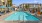 wide pool with reclining seats and nearness to property