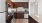 a kitchen with wooden cabinets and ample counter-space