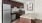 a kitchen with a marble counter top